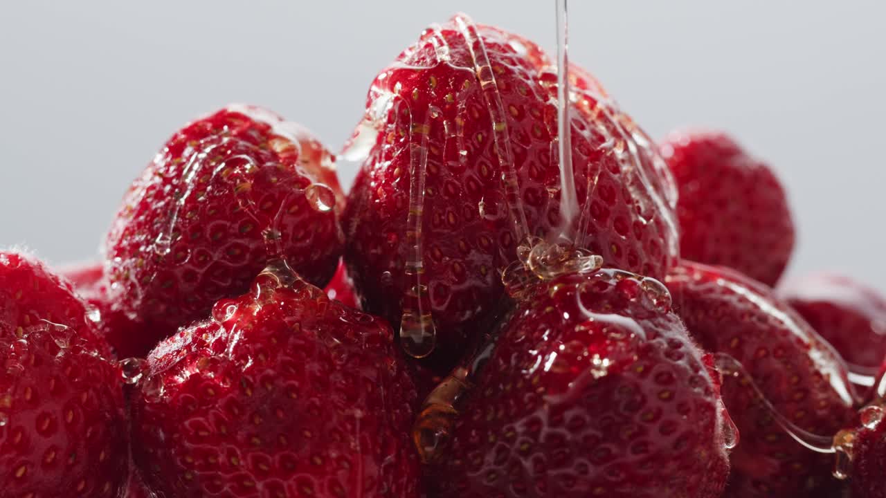 Close-up of Strawberries Drizzled with Honey