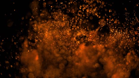 falling fire rocks with sparks and particles on ground isolated on black background 4k,video element for compositing