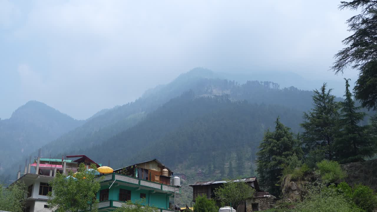 Houses and trees in the mountainous region.