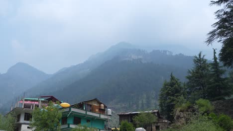 houses and trees in the mountainous region.