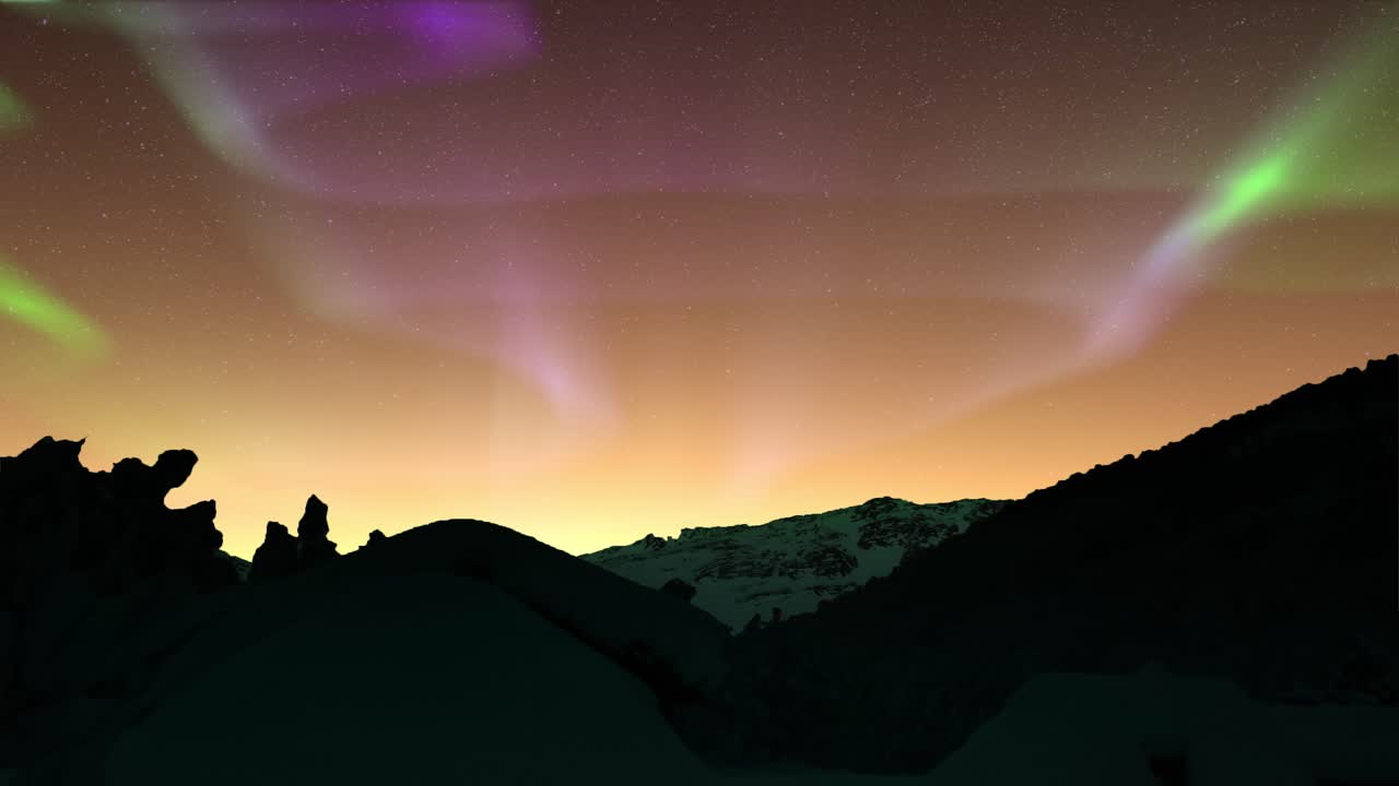 picos de montañas de hielo oscuro con auroras en un cielo despejado