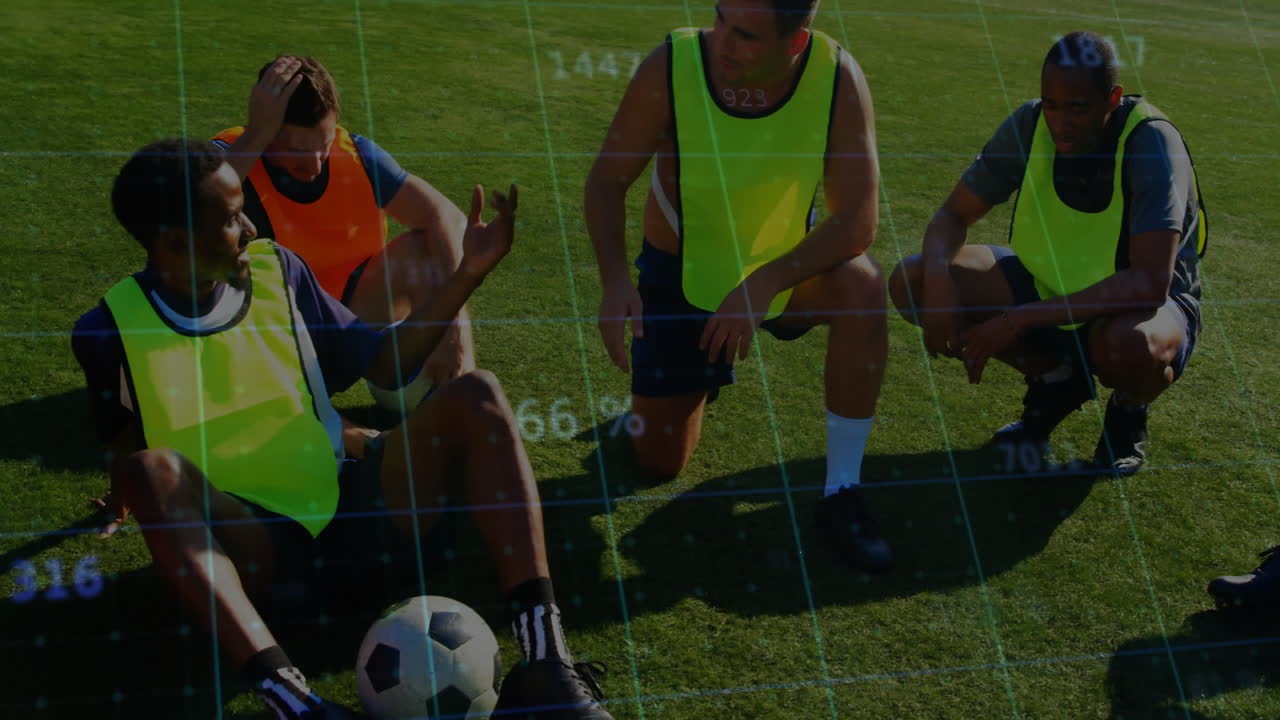 Male soccer players practicing drills on grass field, with animated tactic icons floating above