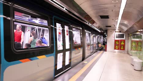 train arrives, passengers board, and train departs