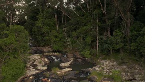 Purling-Brook-beginning-of-the-Falls-filmed-with-a-Drone,-Australia