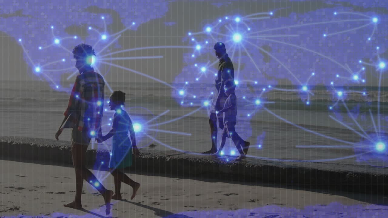 Family strolling beach, man stepping down edge, map fading in linking glowing nodes showing tech