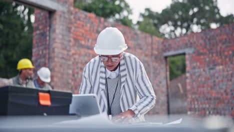 architects and engineers at a construction site
