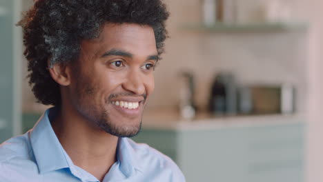 portrait attractive young man smiling confident independent male in apartment home