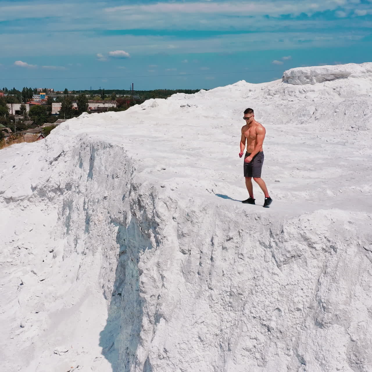 Professional bodybuilder posing. Concept of sport outdoors.