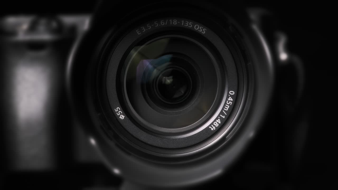 The Camera Lens Rotates, Lights Reflecting Off Glass, Robotic Camera Movement