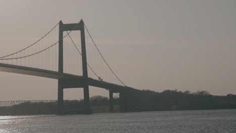 sunset view of lillebælt bridge near middelfart, denmark