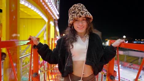 girl at a funfair at night