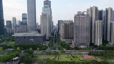 guangzhou downtown city mid afternoon drone track in