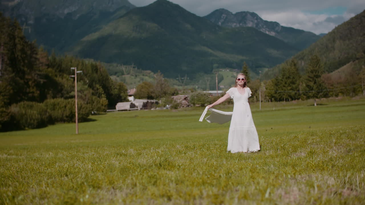 Contemplative Woman in Alpine Landscape