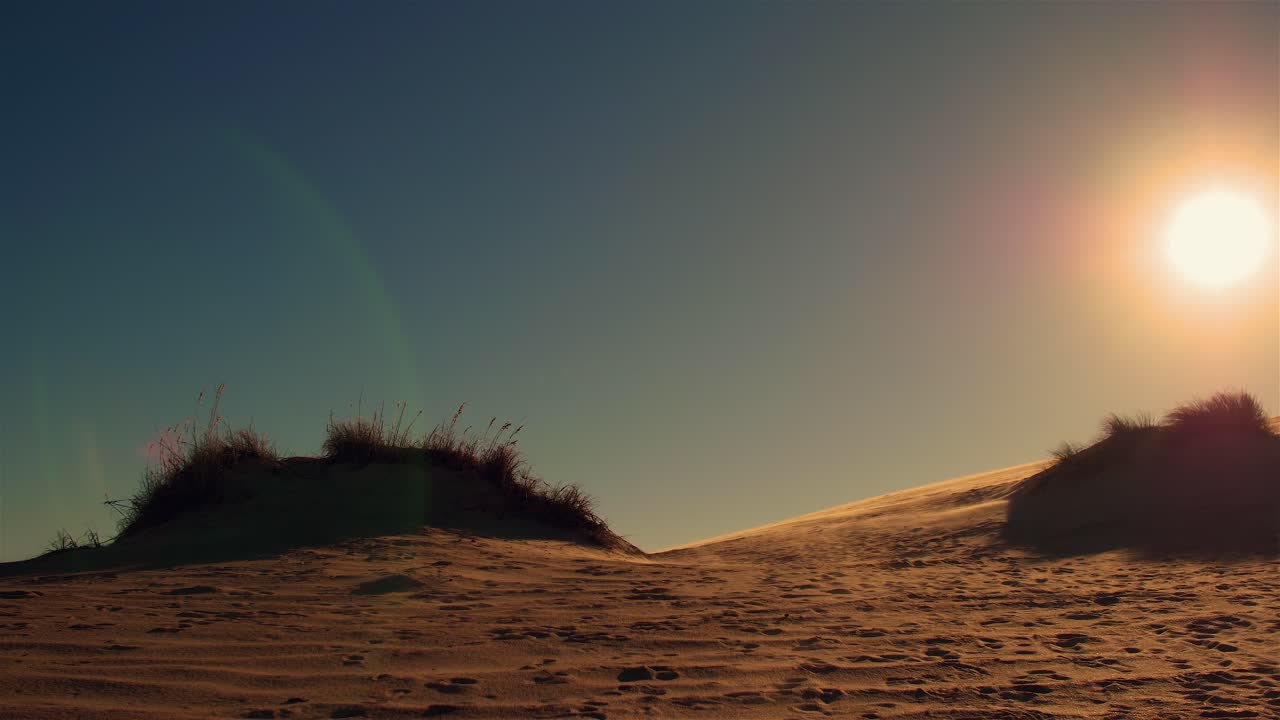 obx duna arena atardecer hora dorada plano general uhd 60fps