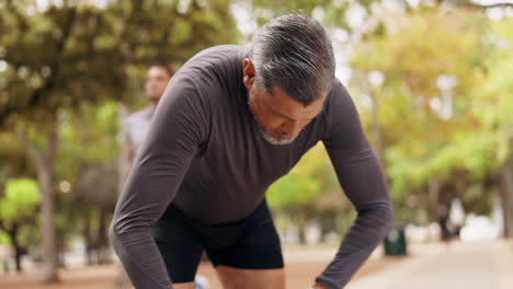 fitness, watch and check of a mature man in a park