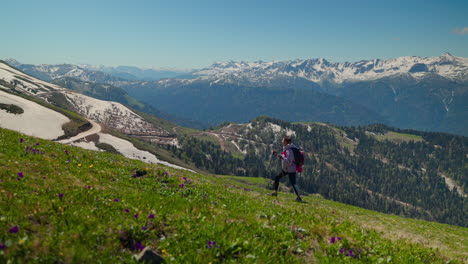 hiking woman in mountainous landscape