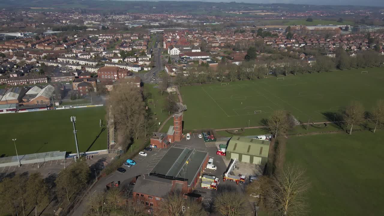 4K aerial view of the fire station of taunton Somerset, United Kingdom, drone rotating to the right with the fire station in the center. 60fps