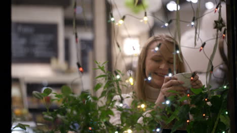 woman drinking tea in cafe