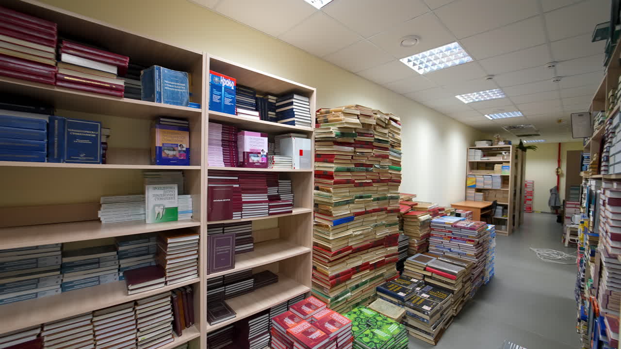 Library books stacks. Bookshelf in library with many books