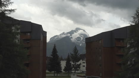 timelapse during a storm that passes by and reveals the mountain peak in les deux alpes, french alps