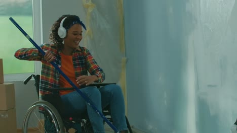 An african american woman in white headphones on a.mov | adult, african, american, apartment
