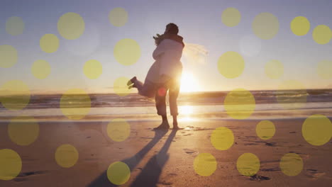 Animation-of-light-spots-over-african-american-couple-getting-married-on-beach