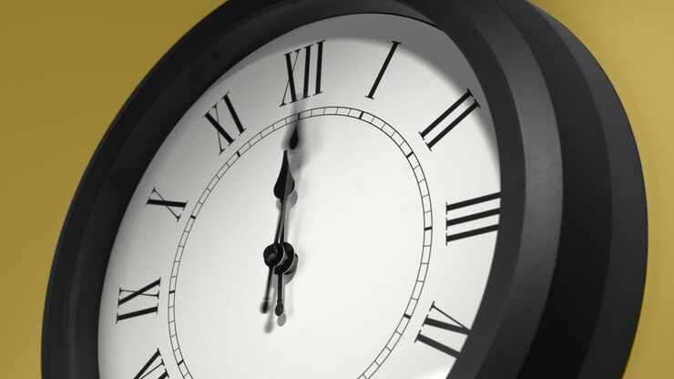 Latin Clock Face on Yellow Wall in Time Lapse