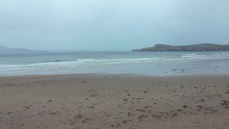 the atlantic coastline in ireland on a cloudy day