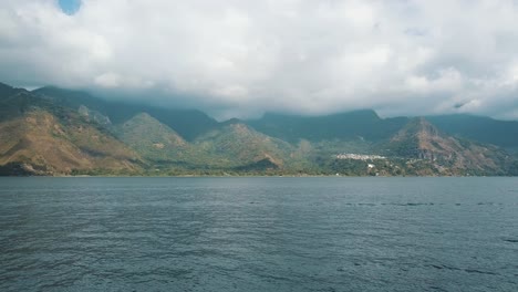 Drone-aerial-flying-over-beautiful-landscape-of-Lake-Atitlan-in-Guatemala