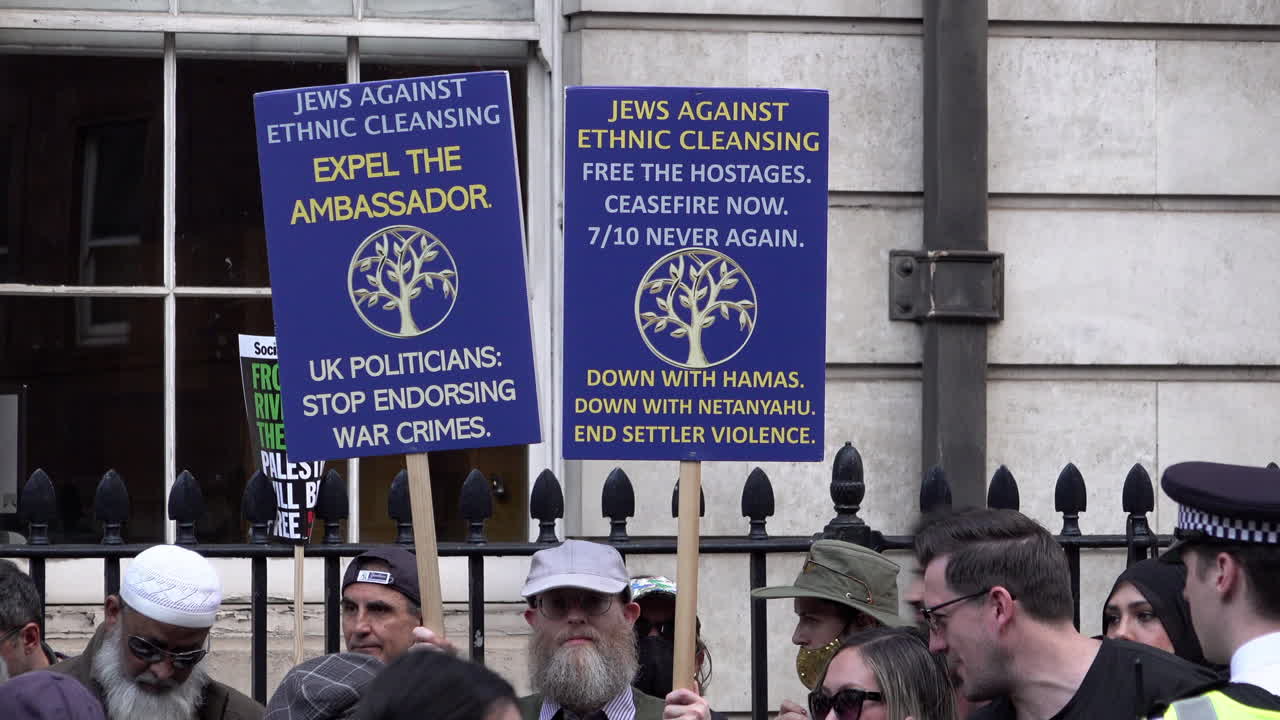 Jewish community members protest against ethnic cleansing, call for ceasefire, and express views on Middle East conflict