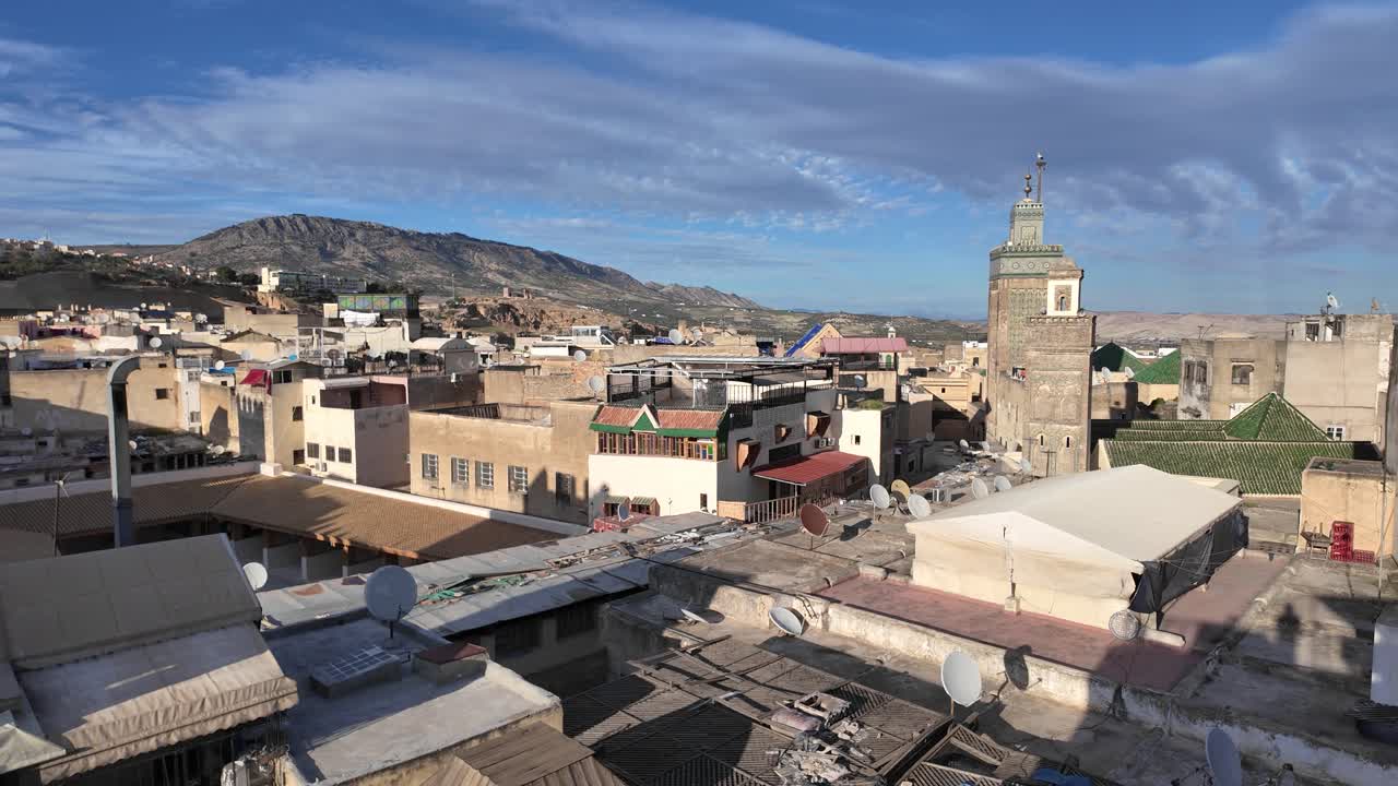 Establishing pan across Bou Inania Madrasa, Islamic school in Fes with intricate Moroccan architecture