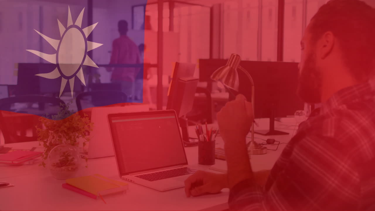 animación de la bandera de taiwán sobre un hombre de negocios caucásico usando una computadora portátil