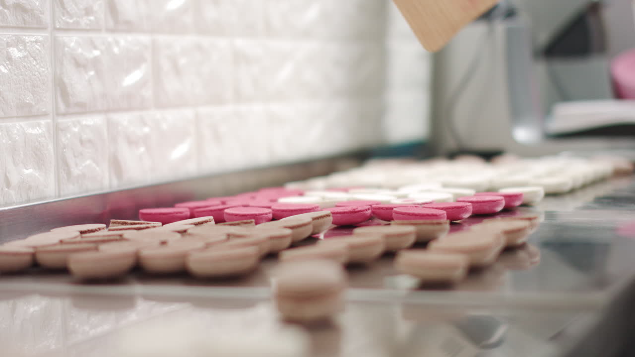 Woman Arranging Macarons
