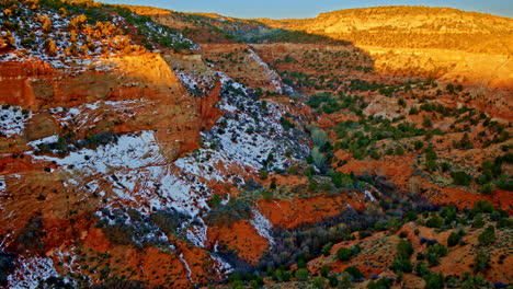 the drone moves slowly and dramatically over the multi-colored hills and otherworldly hoodoos near the utah-arizona border.