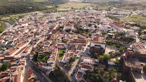 rotating aerial shot of the historic city center of silves in the portuguese region of algarve