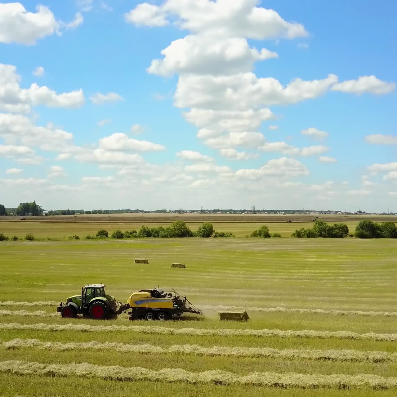 Tractor Collecting Straw