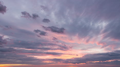 colourful sunset time lapse of cloud layers forming and decaying