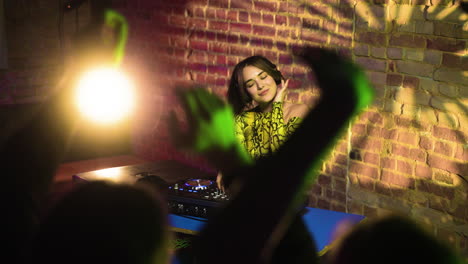 woman djing at the disco