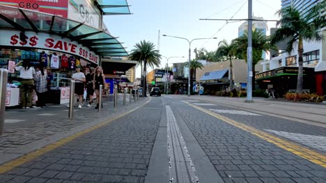 urban street scene with cars and pedestrians