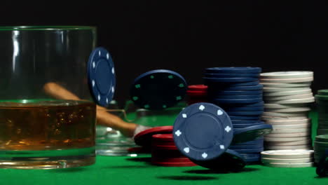 chips falling and bouncing on casino table