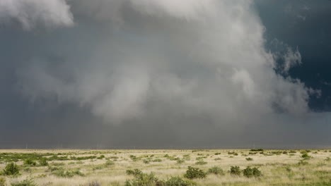 dust blows through the air as a big storm threatens