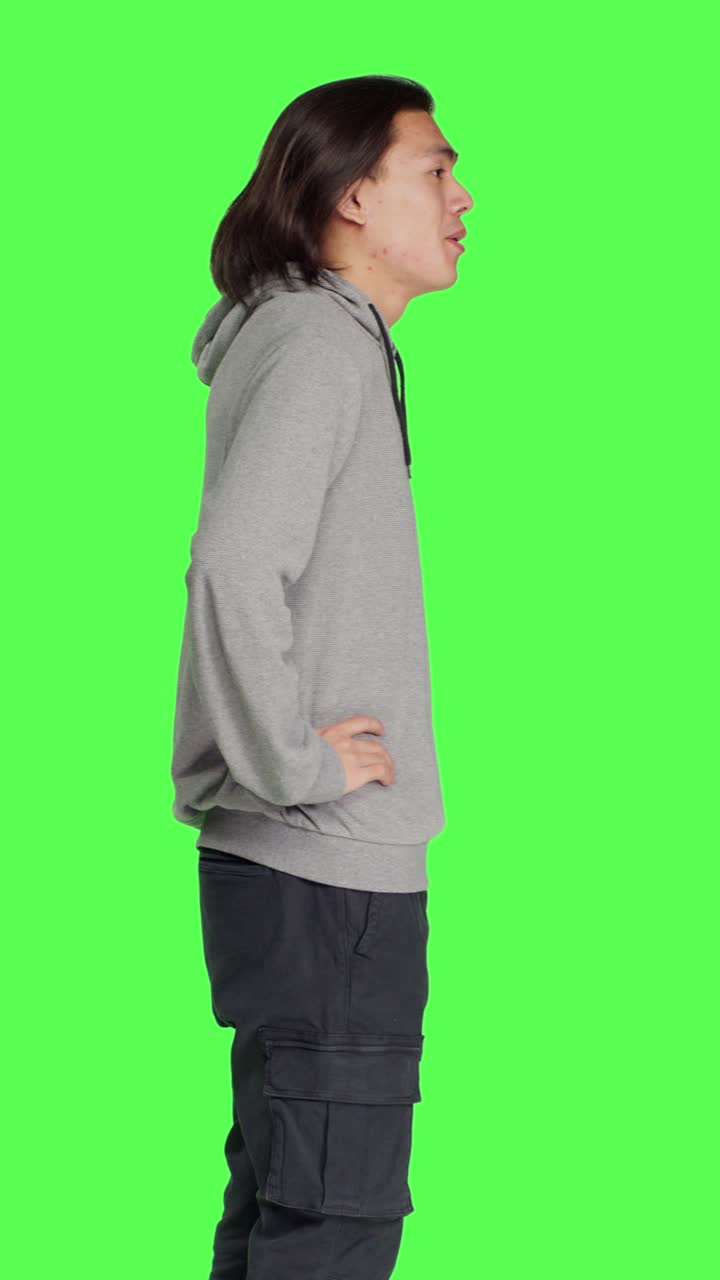 Profile of male model feeling tired and yawning