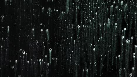 soap suds and water droplets on a dark background