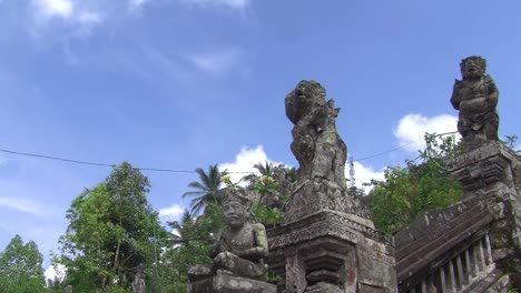 statues of the gate of kehen temple, bali