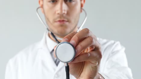 doctor showing his stethoscope against white background 4k 4k