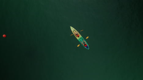 kayakers on a lake
