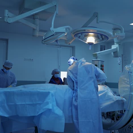 surgeons operating the patient