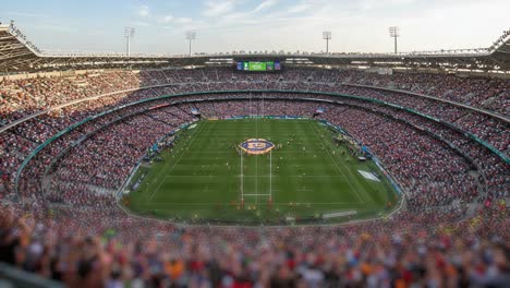spectacular atmosphere at the packed stadium during a thrilling rugby match: fans eagerly engage in the action as teams battle for victory