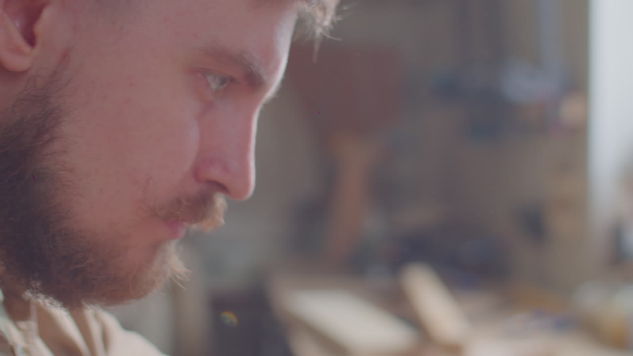 Carpenter Drilling Wood with Hole Saw