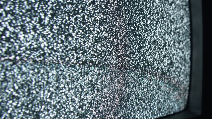Neve televisiva e glitch di rumore su schermo TV VCR